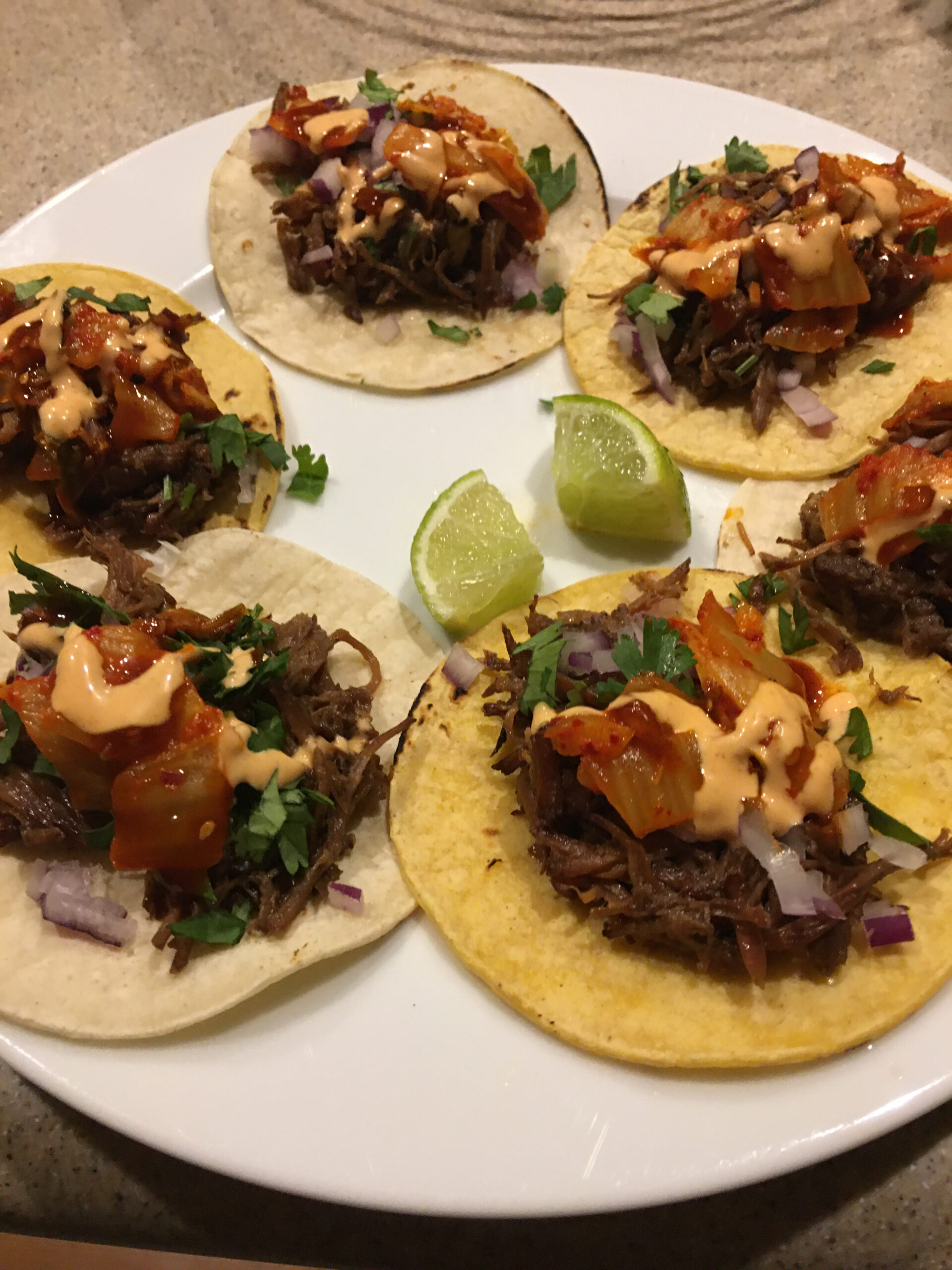 Slow Cooker Korean Beef Tacos with Caramelized Kimchi, Bibimbap Sauce